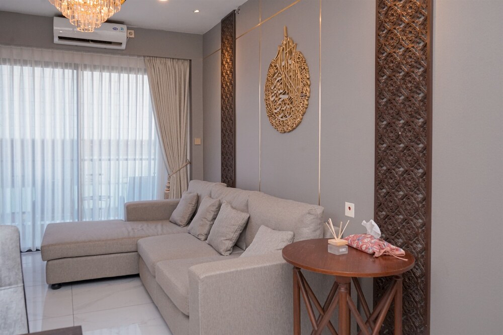 Warm Living 3BR at Sky House BSD Apartment