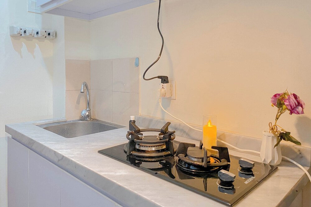 Homey And Good Place Studio At Tifolia Apartment