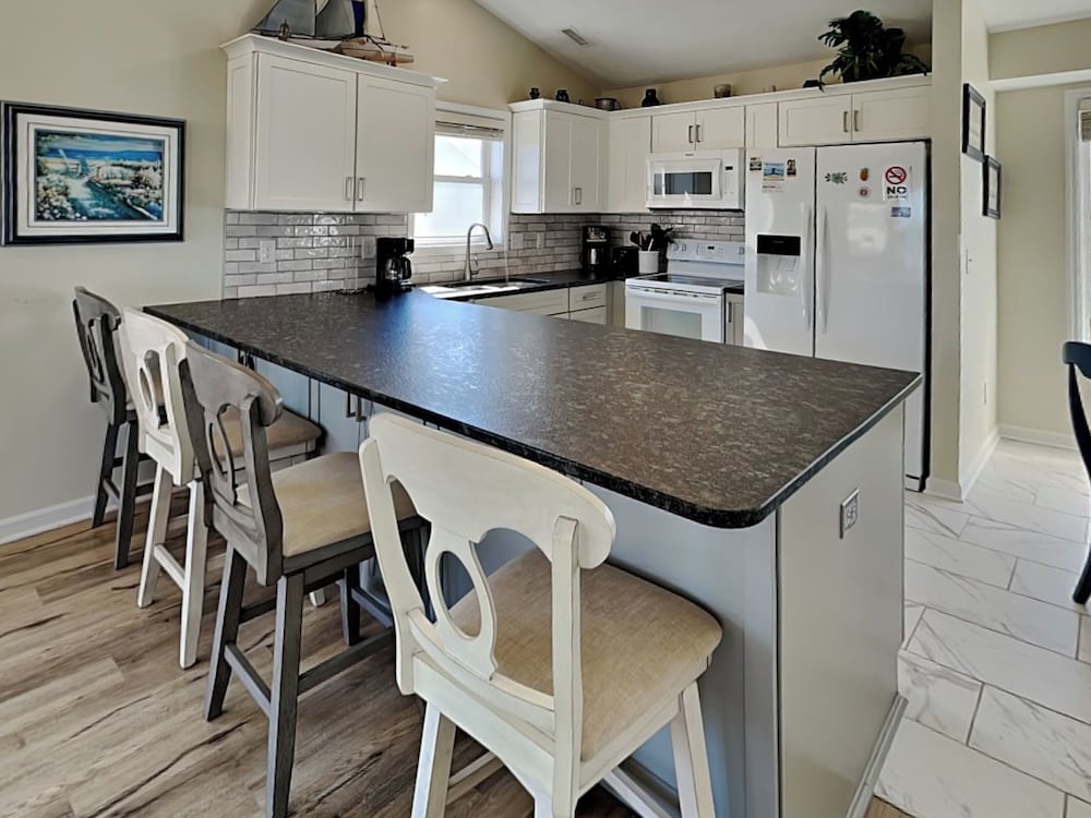 Song Of The Sea by Topsail Realty