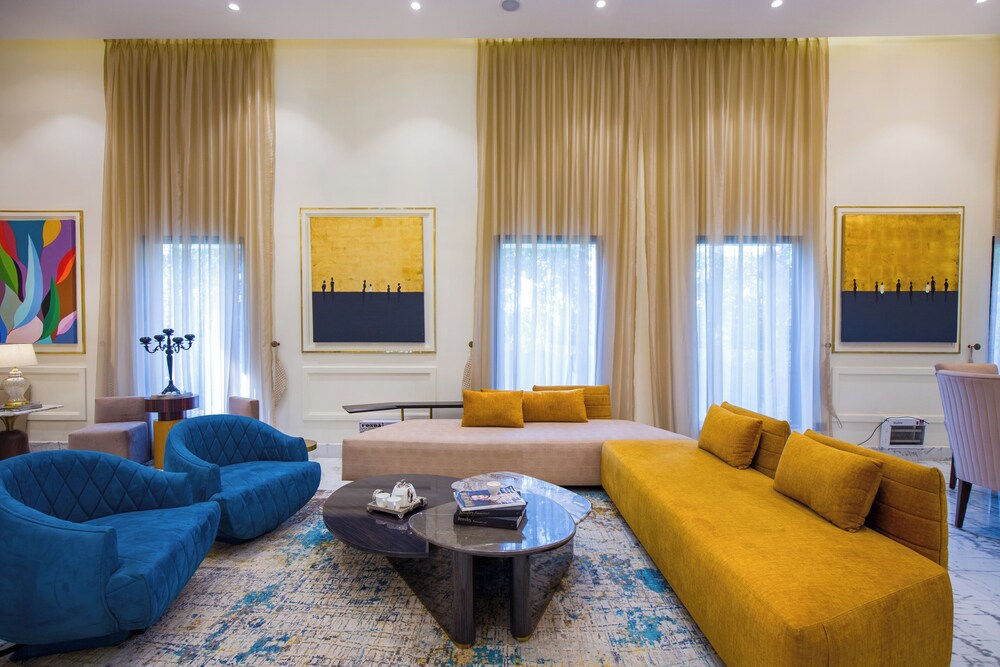 ELIVAAS Ibiza Luxe 4-BHK Farmhouse