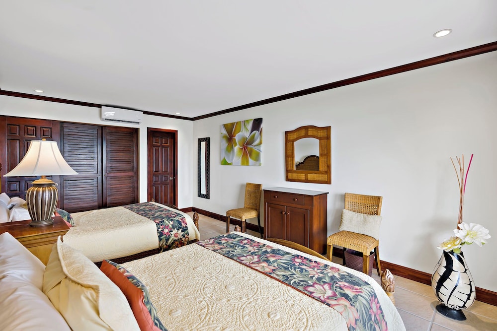 Remodeled Top-Floor Condo with Stunning Wrap-Around Balcony Offering Mountain, Ocean & Marina Views