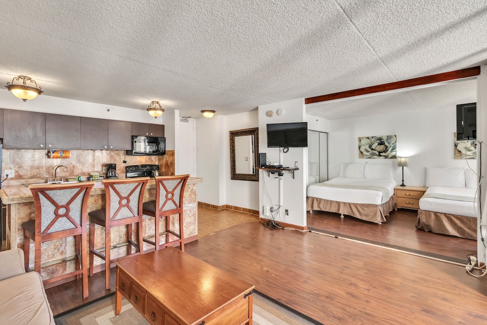 Waikiki Banyan Condo Located One Block From Waikiki Beach! by Koko Resort Vacation Rentals