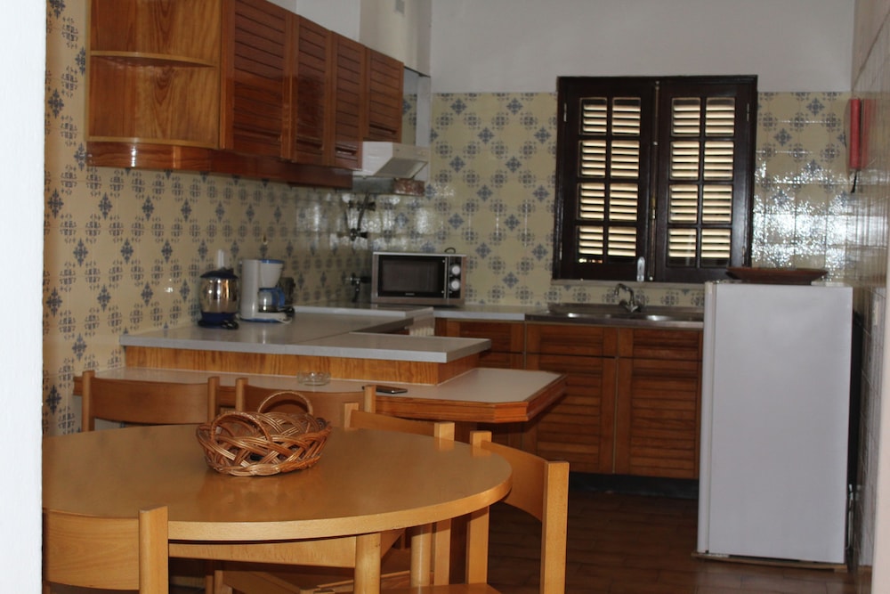 Cheerfulway Oura Village Garden Apartamentos