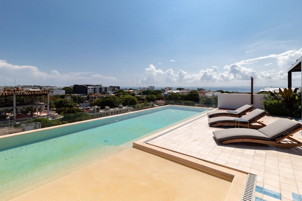 Riva 202 Playa del Carmen Condo Minutes from the Beach and 5th Avenue by RedAwning view 5