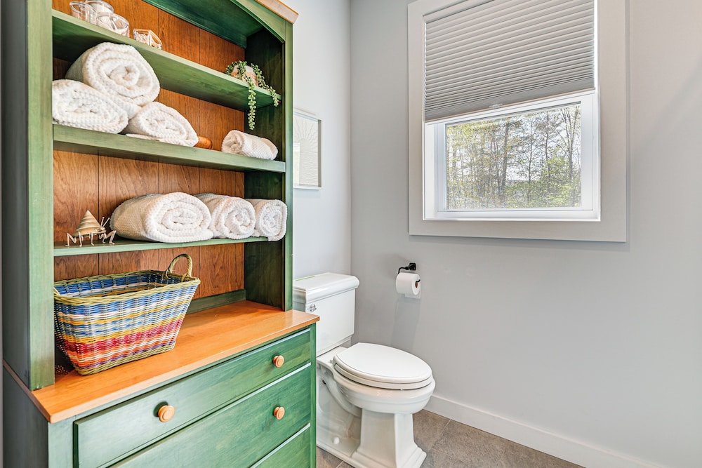 Fire Pit + Beach Access: Quiet Northville Retreat
