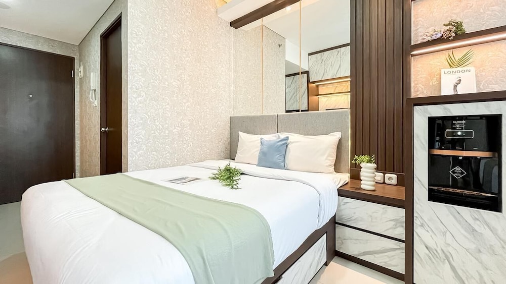 Earth Tone Studio Apartment At Transpark Bintaro