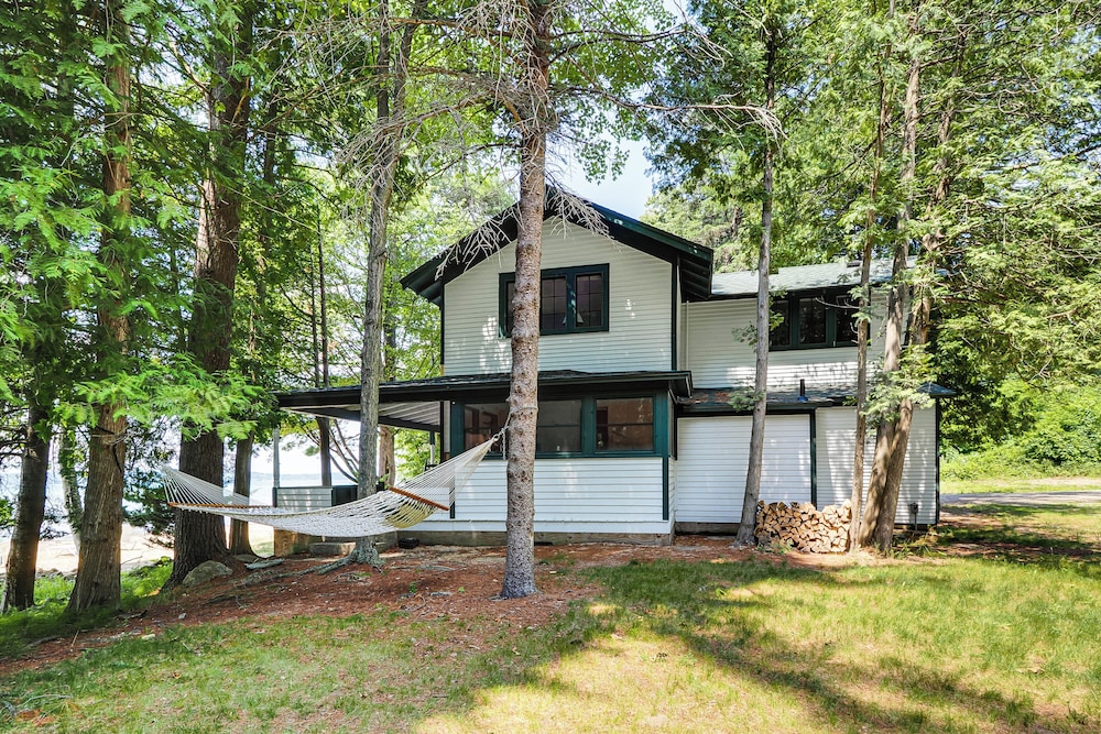 Torch Lake Getaway w/ Private Beach + Boat Dock!
