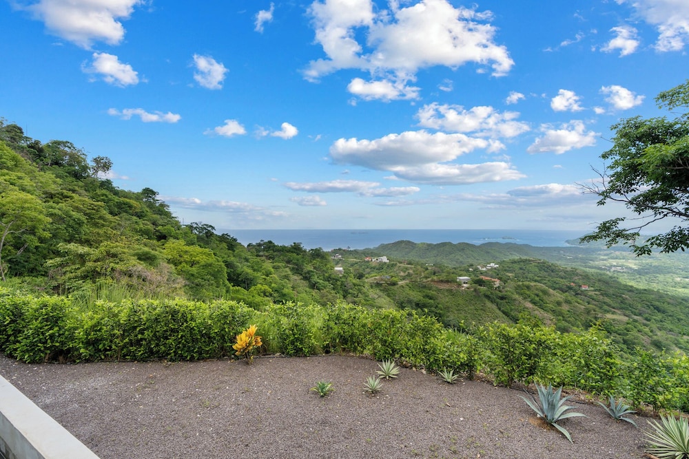 Mountainside Home with Modern Design, Sweeping Ocean Views & Private Swimming Pool