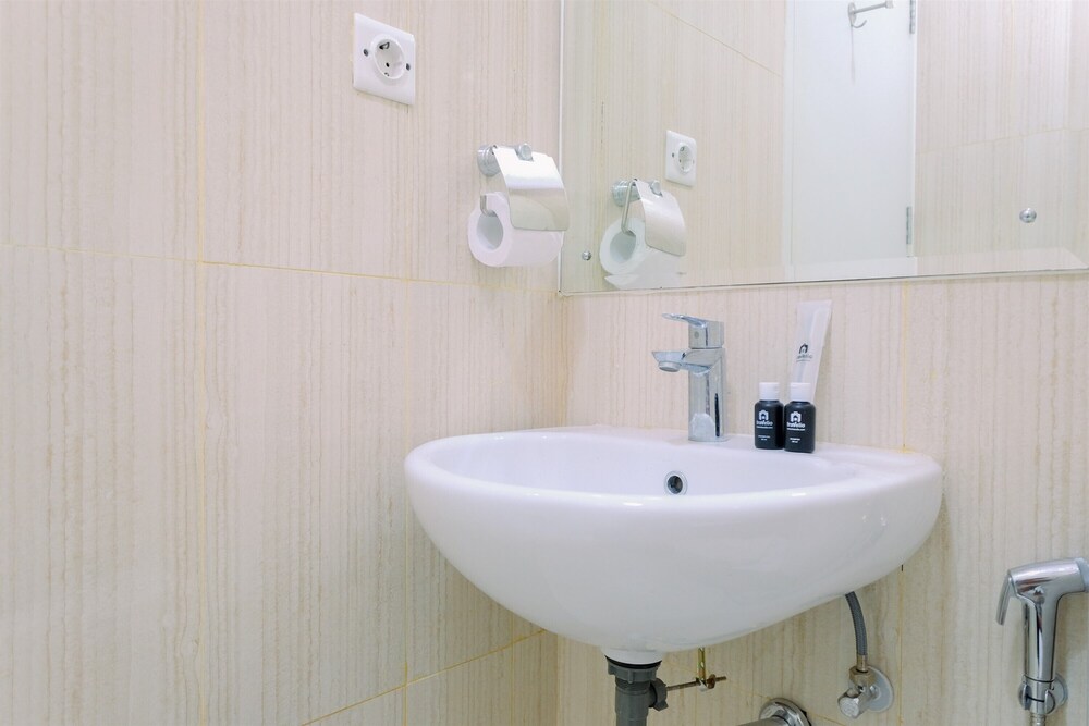 Restful and Modern 2BR at Sentul Tower Apartment