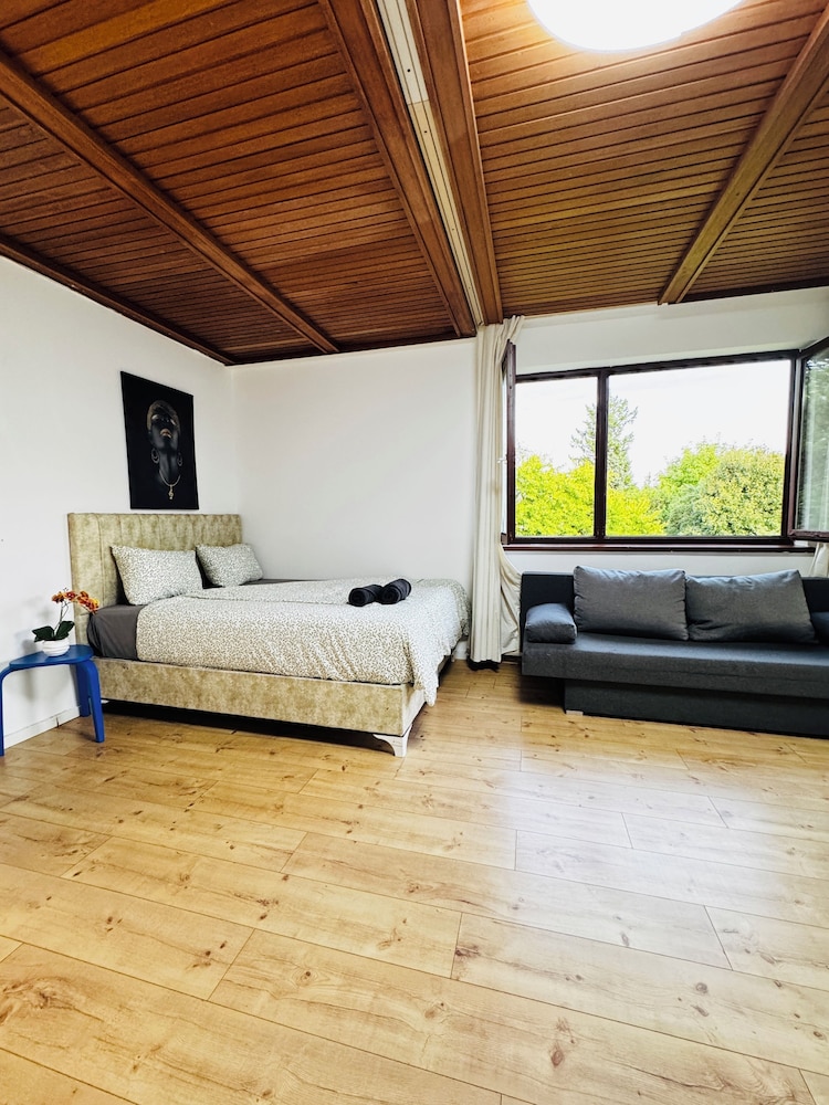 Central 8BR Stay with Garden and Terrace