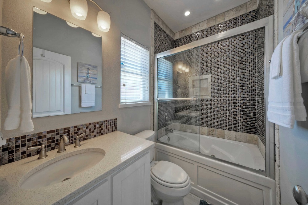Pool Access, Private Patio Living, Near the Beach Seahorse Cove by Avantstay