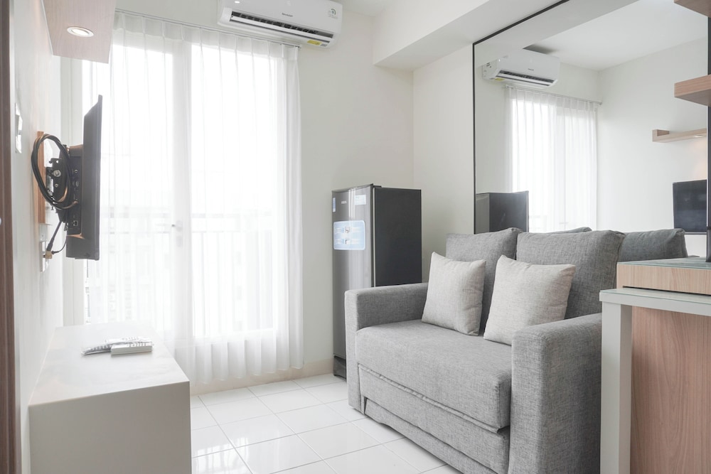 Homey and Minimalist 2BR at Podomoro Golf View Apartment