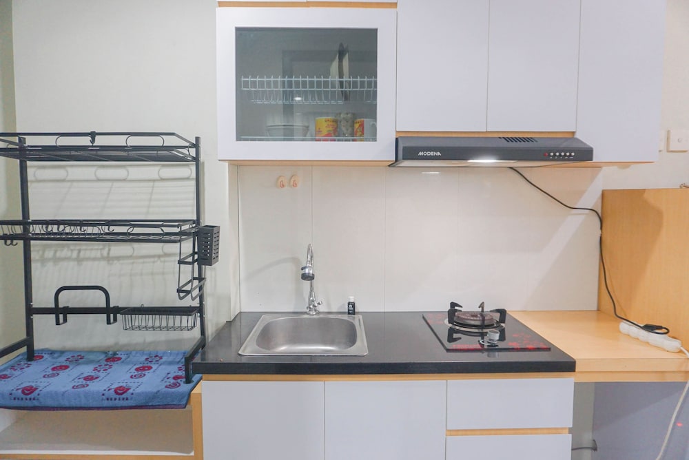 Cozy Stay and Strategic Studio Apartment at Grand Dhika City