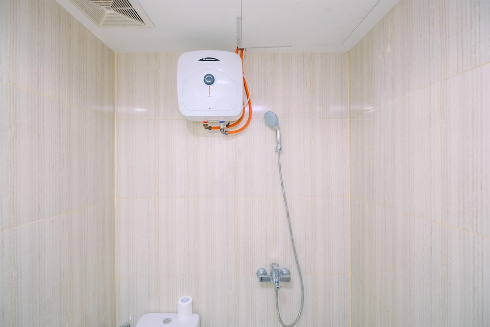 Comfort and Homey 2BR at Sentul Tower Apartment