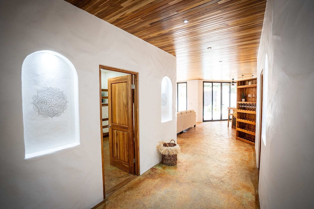 Bohemian Tropical Villa with a Tiki-Style Swimming Pool & Swim-Up Bar with an Attached Studio Apartment