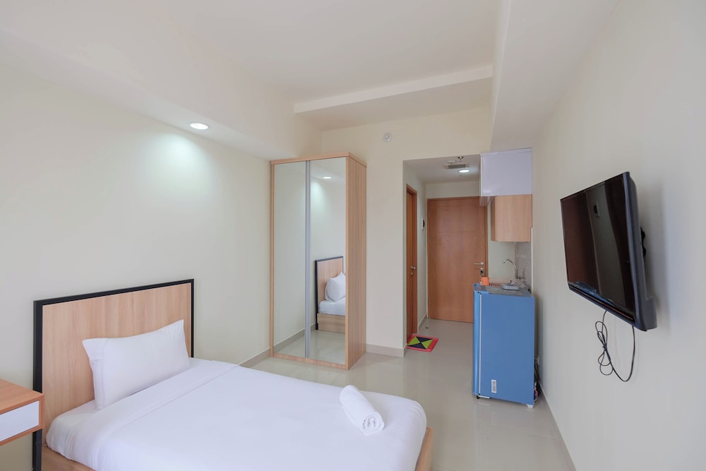 Warm And Cozy Studio At Evenciio Margonda Apartment