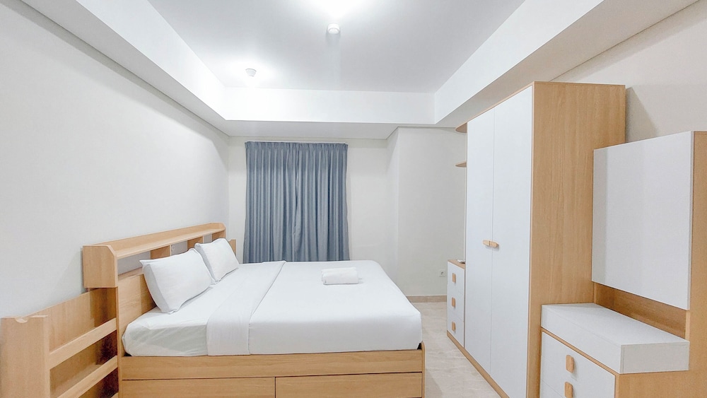 Spacious and Homey 2BR at Podomoro City Deli Medan Apartment