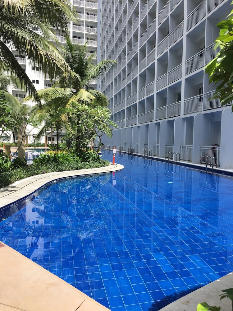 Relax in Pasay City's Best Kept Secret - Spacious Condo With Garden View