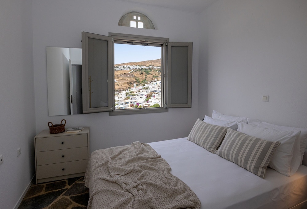 By The Stone Tinos