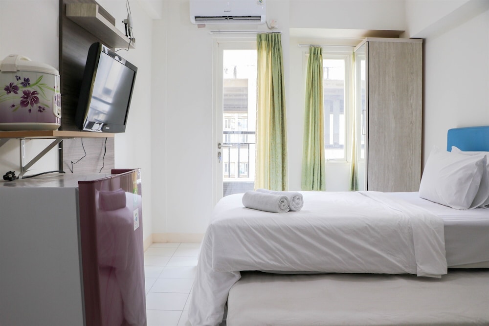 Warm and Nice Studio at Podomoro Golf View Apartment