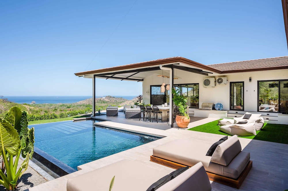 Luxe Tropical Villa with Sparkling Infinity Pool, Panoramic Ocean Views & Community Amenities