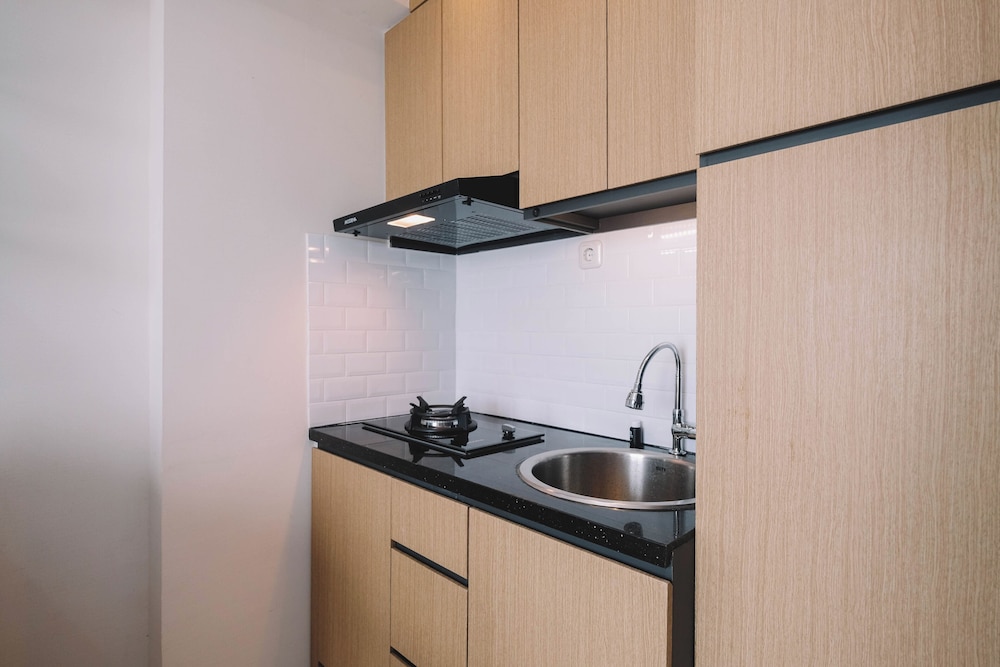 Simple and Cozy Living 2BR at Podomoro Golf View Apartment