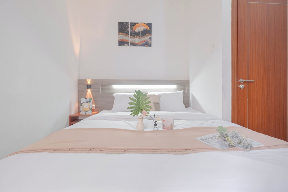 Minimalist and Well Designed 2BR Apartment with Extra Room at Vittoria Residence