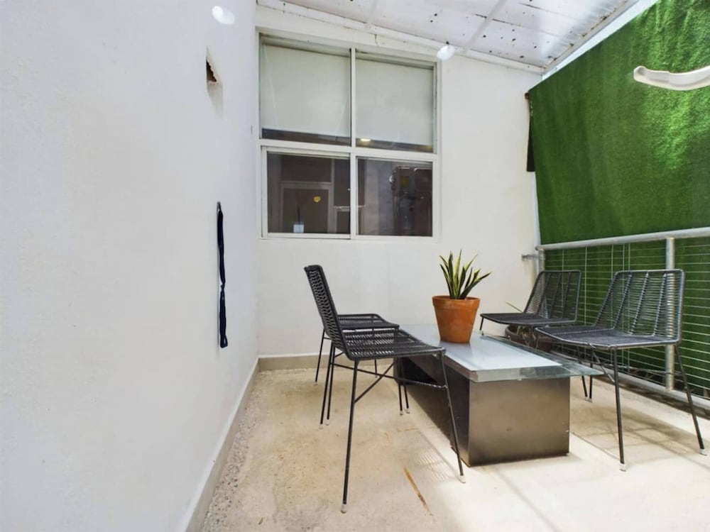 Stylish 2BR Retreat With Private Patio