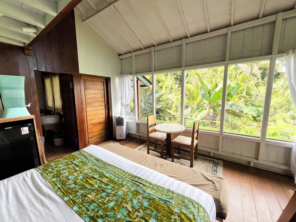 Frame Cabin with Endless Rice Field View