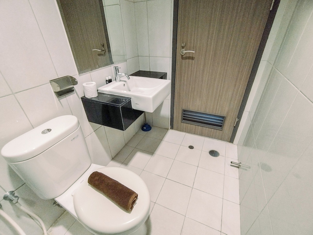 Homey Designed 2BR in City Center at Praxis Apartment