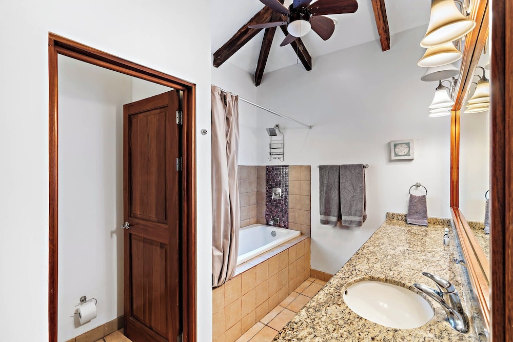 Inviting Home with Colorful Decor and Private Backyard Oasis with a Swimming Pool & Shaded Terrace
