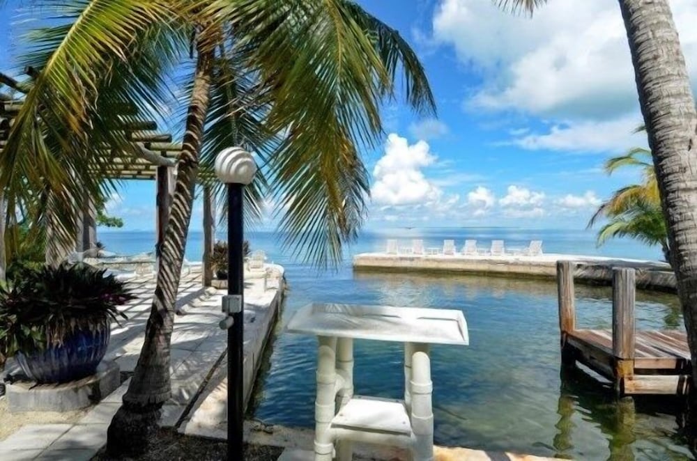 Complete Duplex On Gated Bayfront Property 4 Bedroom Apts by RedAwning