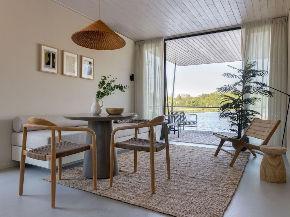 Modern Lodge on the Water in a Holiday Park view 3