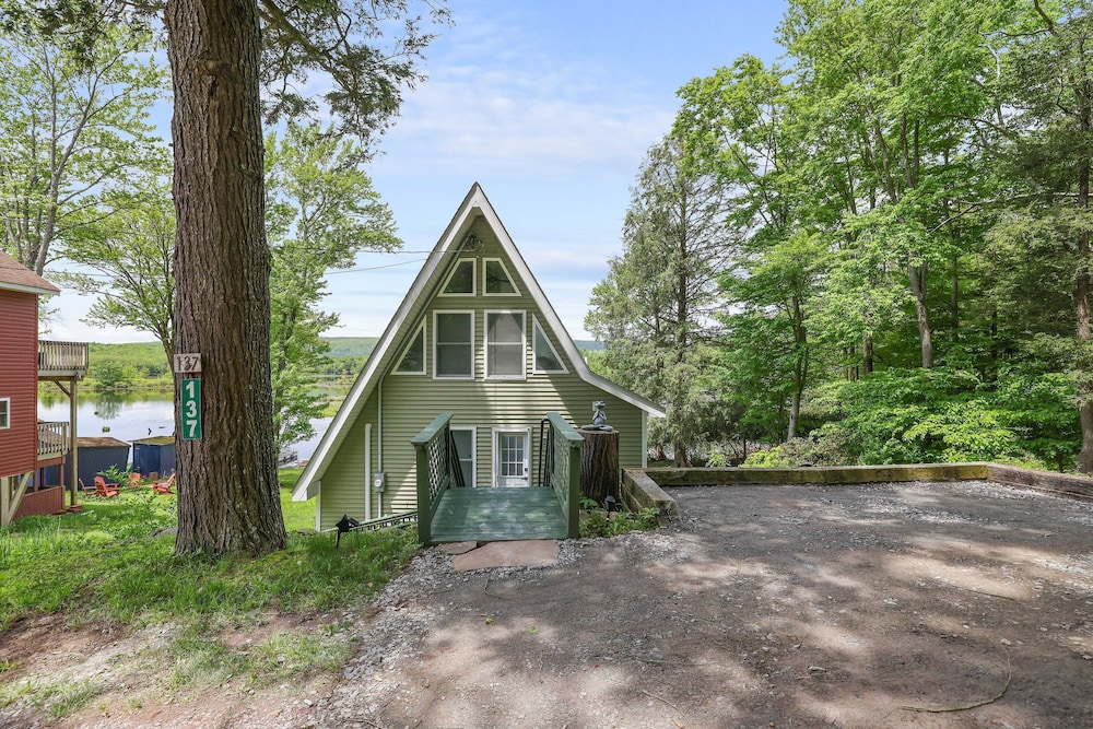 Lakefront A-frame Dock Kayaks Fire Place