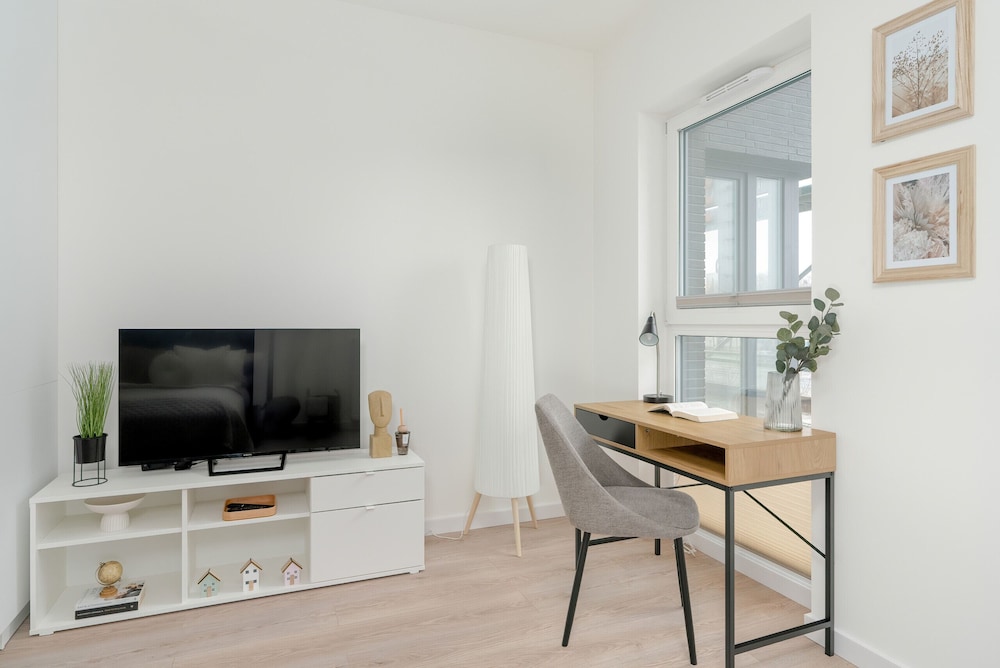 Minimalist Studios in Poznań by Renters