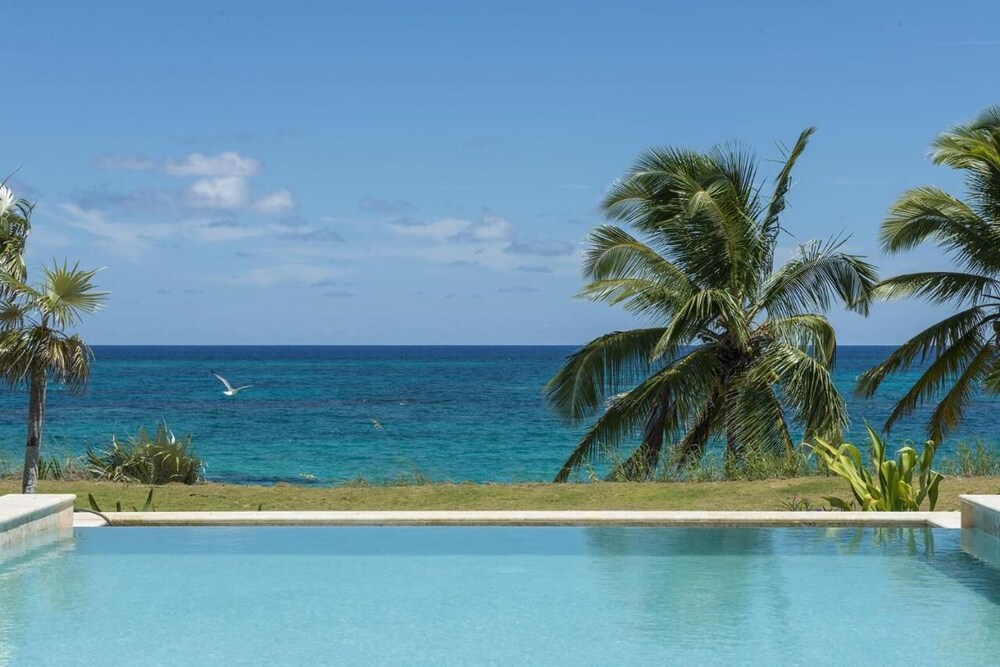 Dream Villa: Private Oasis Above Pink Sand Beach