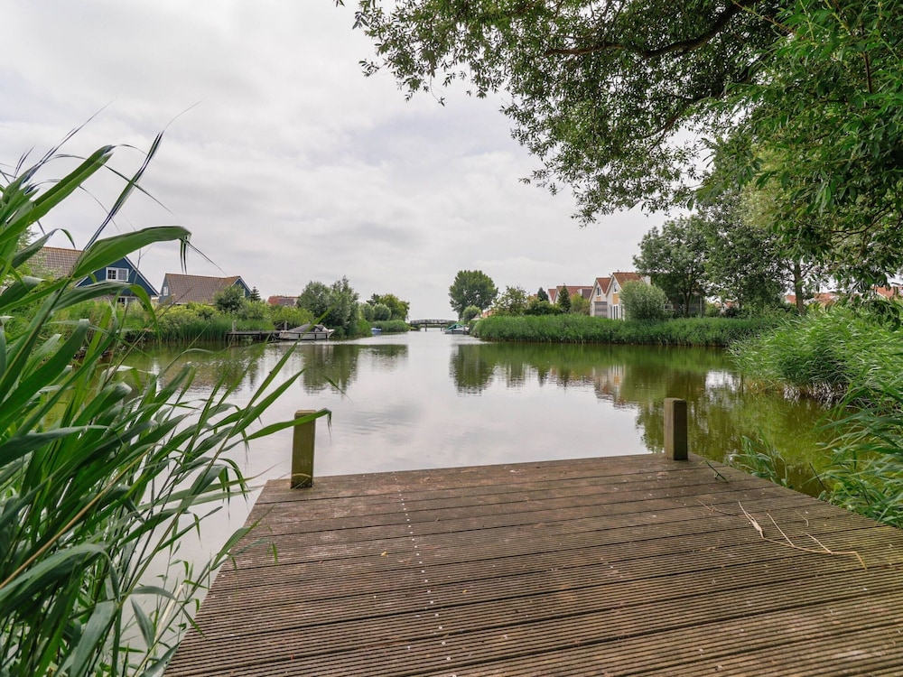 Nice Holiday Home on the Water in Friesland