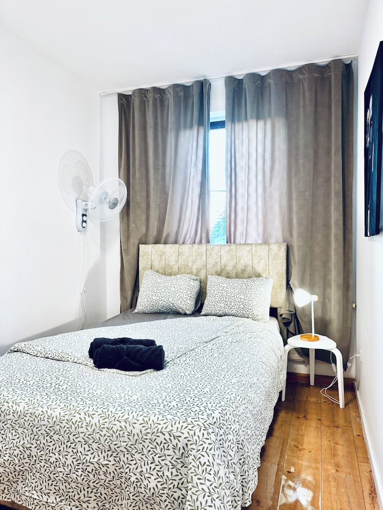 Central 8BR Stay with Garden and Terrace