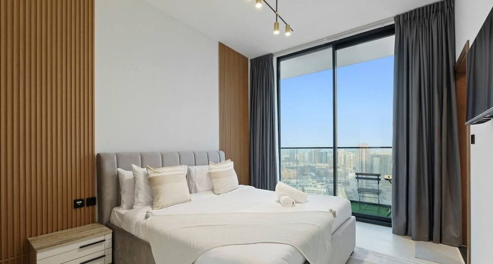 Modern 2BR w Balcony in JVC nr Dubai Sports City