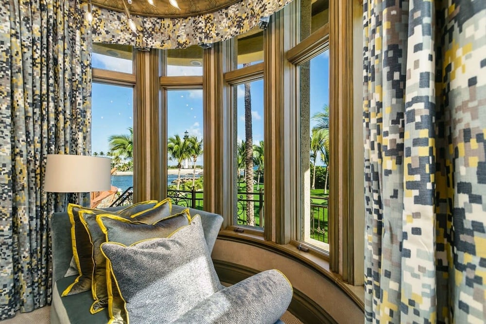 Luxurious 3-story Estate With Gym Pool Slide Private Beach and Lighthouse Views