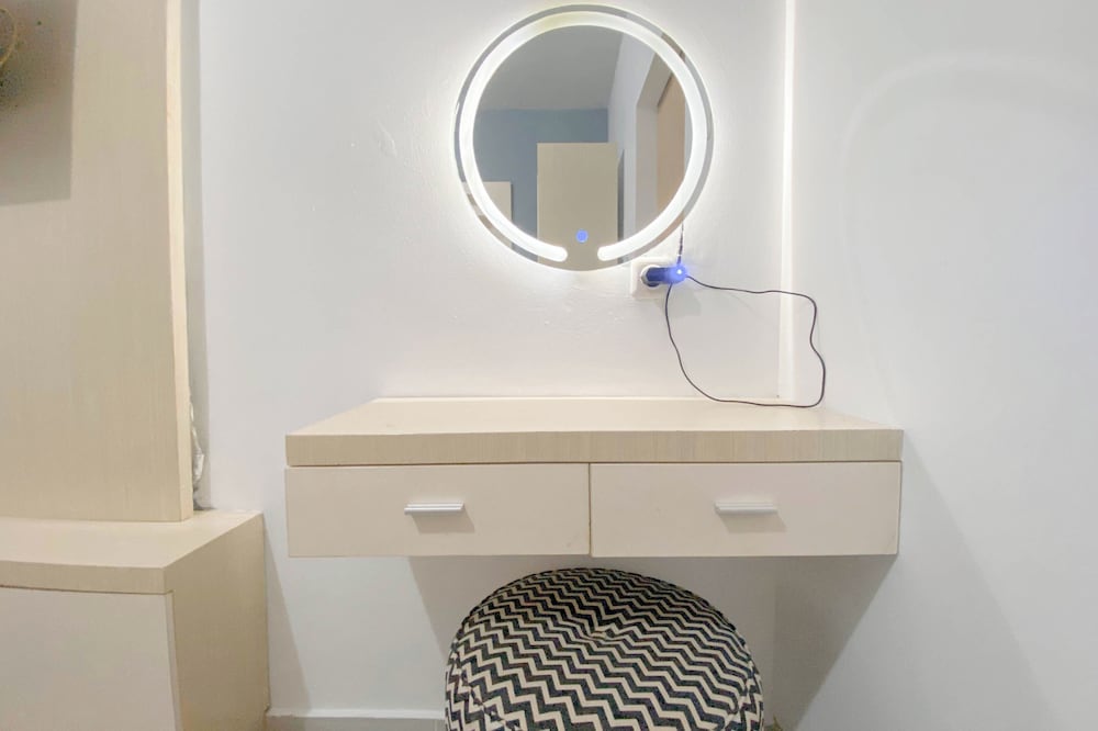 Simple White Studio Apartment At The Alton Semarang