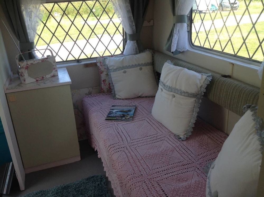 Kitty Unique 60s Caravan set in Pretty Garden view 2