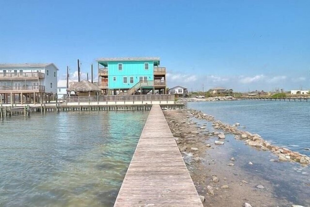 Waterfront Escape w/ Views Shared Pool & Boat Dock Orange Crush by Avantstay