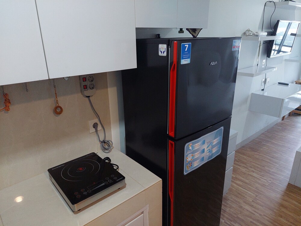 Warm and Cozy Studio at Springwood Residence Tangerang Apartment