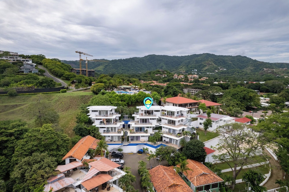 Modern Top-Floor Condo with Panoramic Views and Community Pool