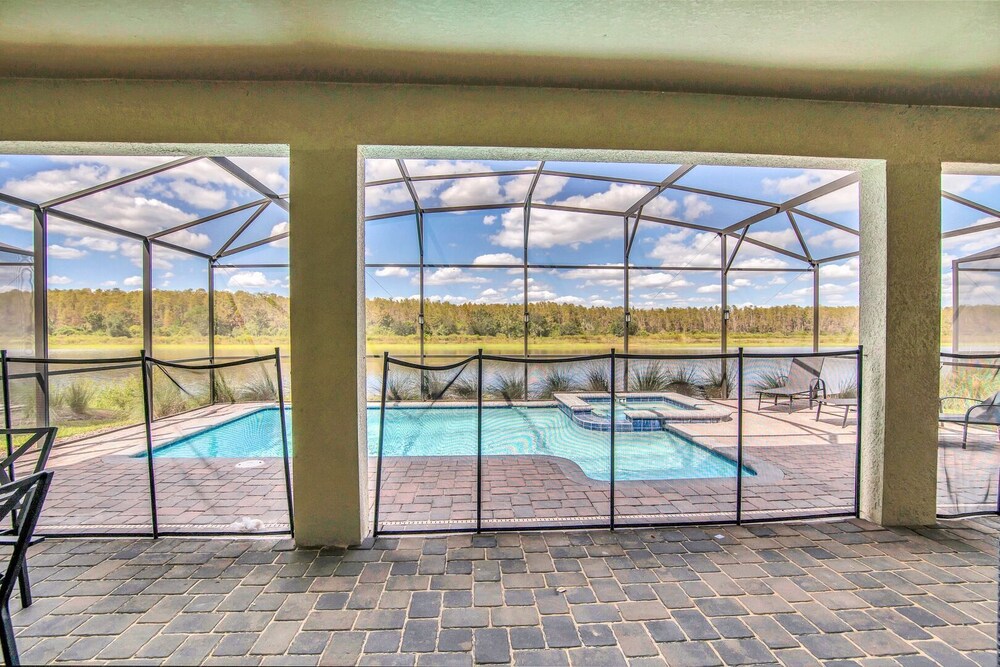 Serenity Lakeview Retreat Stunning Water Views, No Rear Neighbors, Private Pool, Game Room & Star Wars Cinema