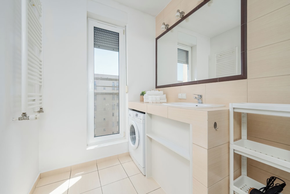 Wroclaw Dark Blue Apartment by Renters