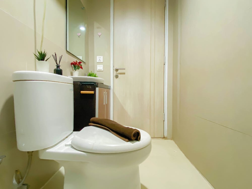 Simple 2Br At Azalea Suites Apartment