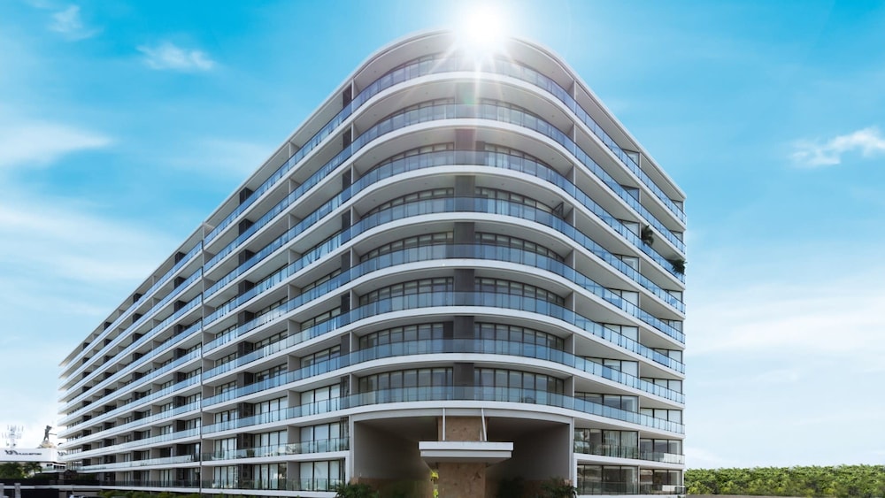 Grand Club Marina Condo at Live Aqua Private Residences Nima Bay