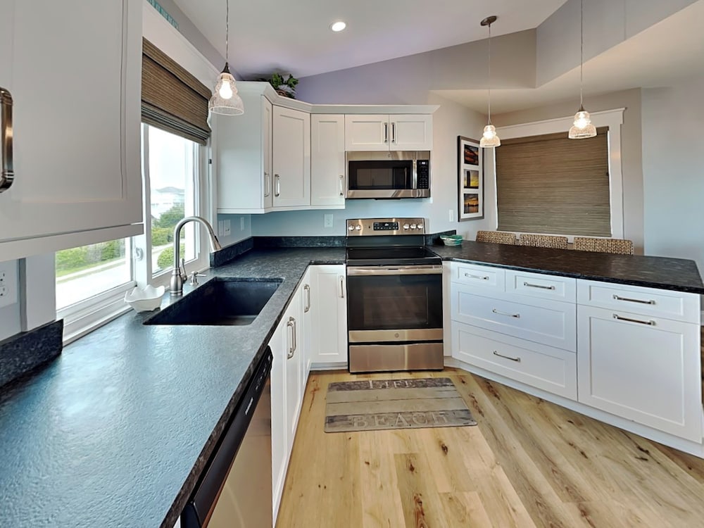 Squirrelly Banana by Topsail Realty